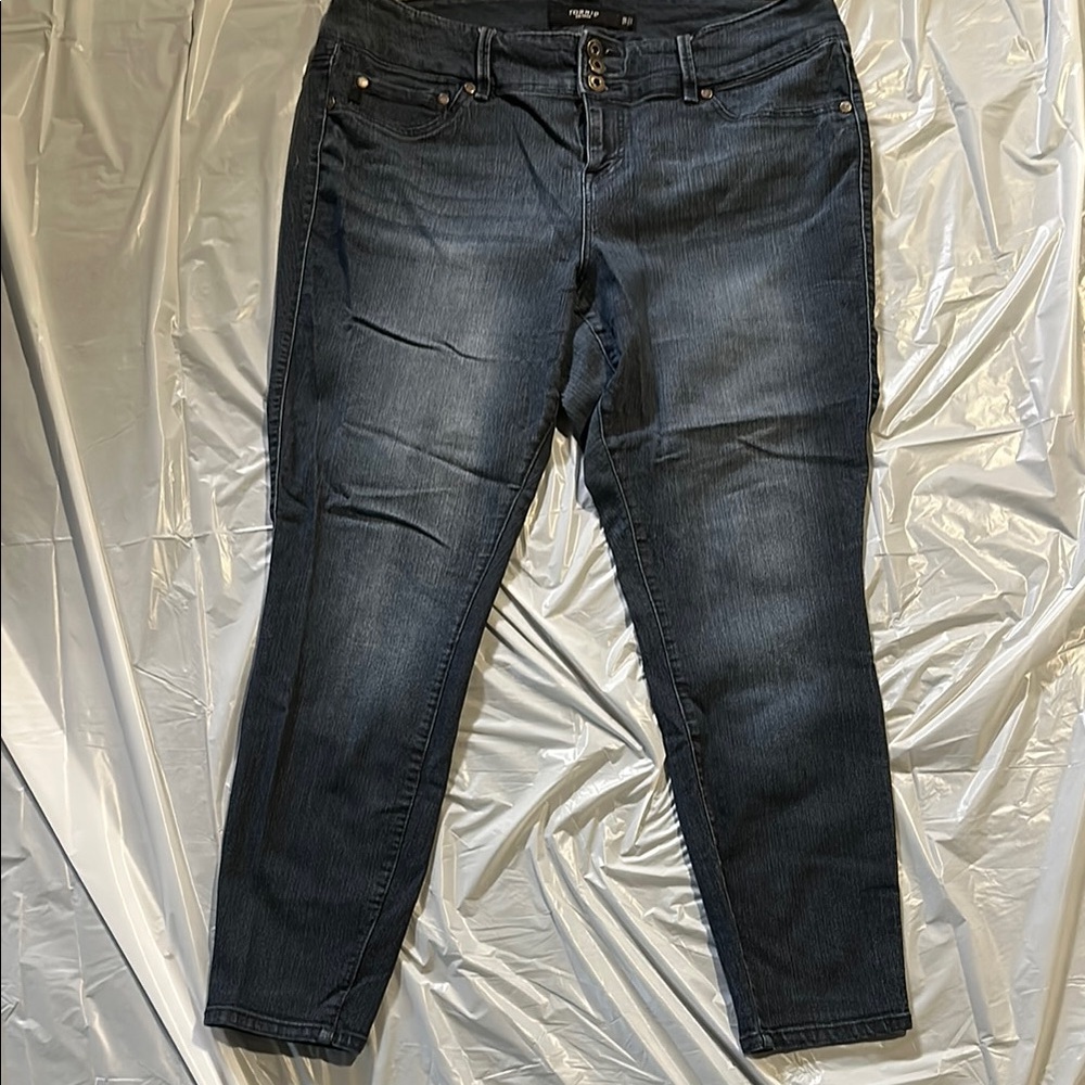 Torrid Blue Skinny Jeans with Tapered Leg and Distressed Look